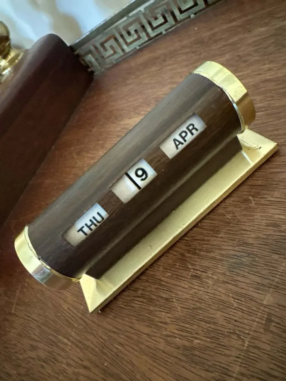 Vintage Mid Century Brass and Faux Wood Cylindrical Perpetual Desk Calendar